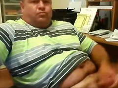 Chunky daddy stroking at office